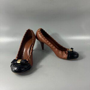 Tory Burch Women's Romy Brown Almond Leather Black Patent Cap Toe Heels, 8.5